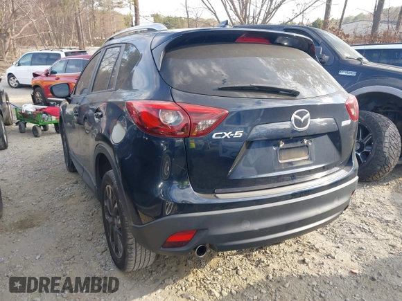 2016 Mazda CX-5 Grand Touring with VIN JM3KE2DY1G0708572, listed as a IAAI auction lot 41685298 with 109,427 mi miles. Bid and sale history available at carsss.com. Image 3.