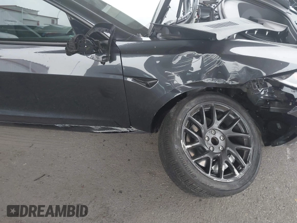2024 Tesla Model 3 z VIN 5YJ3E1EA3RF737102, wystawiony jako IAAI lot #41562661 z przebiegiem 9 638 mil mil oraz . Historia ofert i sprzedaży dostępna na DreamBid. Obrazek 6.
