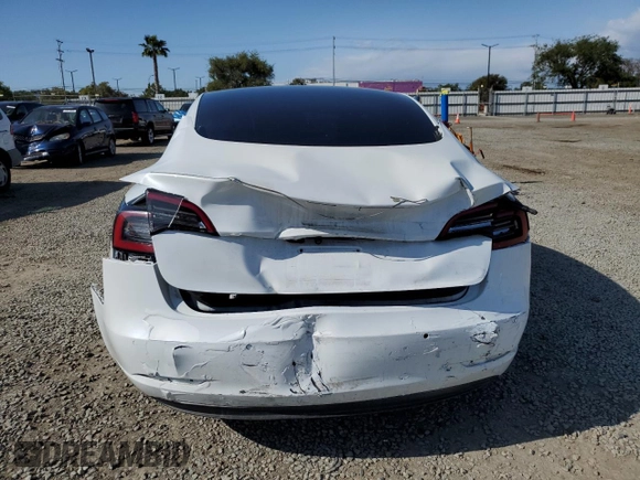 2021 Tesla Model 3 Standard Range Plus with VIN 5YJ3E1EA0MF072457, listed as a Copart auction lot 51666135 with 32,534 mi miles and Salvage Title. Bid and sale history available at carsss.com. Image 6.
