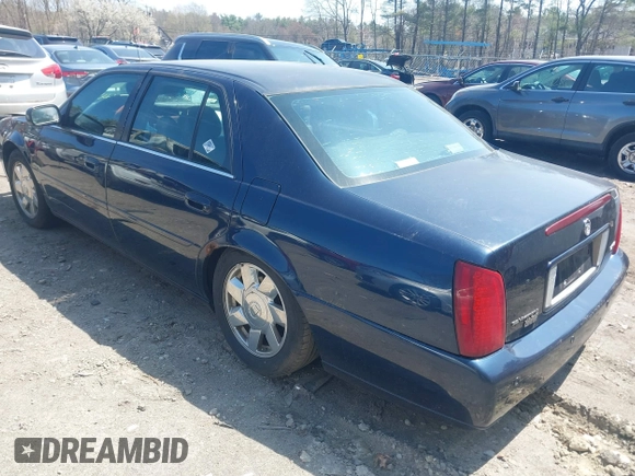 2002 Cadillac DeVille DTS with VIN 1G6KF57912U205527, listed as a IAAI auction lot 42064174 with 135,002 mi miles. Bid and sale history available at carsss.com. Image 3.