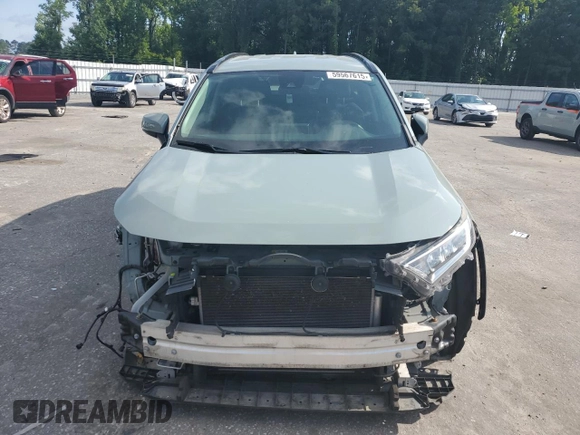 2020 Toyota RAV4 XLE with VIN 2T3P1RFV2LC084813, listed as a Copart auction lot 59567615 with 126,676 mi miles and Salvage title. Bid and sale history available at DreamBid. Image 5.