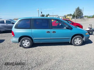 1998 Dodge Caravan with VIN 2B4FP253XWR829741, listed as a IAAI auction lot 42173839 with 123,783 mi miles and . Bid and sale history available at carsss.com. Image 13.