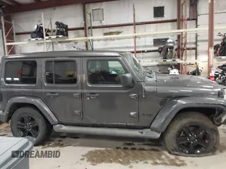 2020 Jeep Wrangler Unlimited Sahara with VIN 1C4HJXEN8LW293757, listed as a IAAI auction lot 41435340 with 28,385 mi miles. Bid and sale history available at carsss.com. Image 13.
