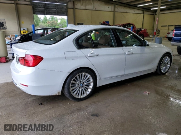 2013 BMW 3 Series 328i with VIN WBA3A5G52DNP18972, listed as a Copart auction lot 58122935 with 209,173 mi miles and Salvage title. Bid and sale history available at DreamBid. Image 3.