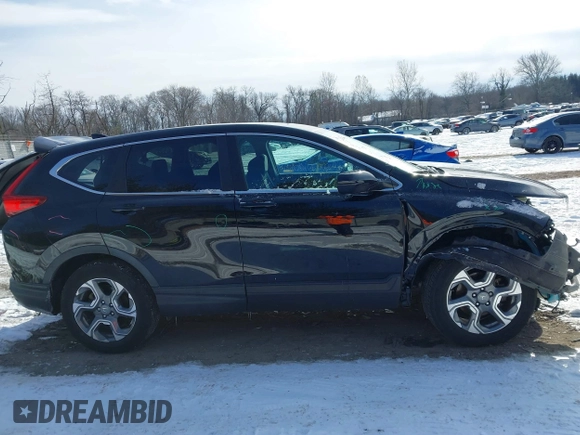 2019 Honda CR-V EX with VIN 7FARW2H59KE049921, listed as a IAAI auction lot 41366936 with 69,325 mi miles. Bid and sale history available at carsss.com. Image 12.