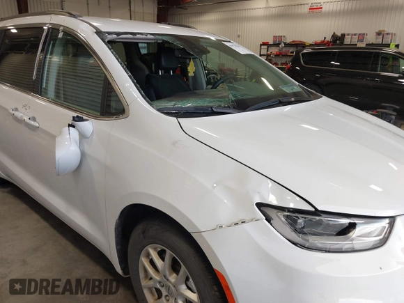 2022 Chrysler Pacifica Touring L with VIN 2C4RC1BGXNR144831, listed as a IAAI auction lot 40473026 with 36,495 mi miles and . Bid and sale history available at DreamBid. Image 6.