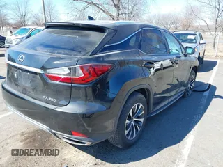 2020 Lexus RX 350 with VIN 2T2HZMDA2LC251790, listed as a IAAI auction lot 41769873 with 70,043 mi miles and . Bid and sale history available at DreamBid. Image 4.