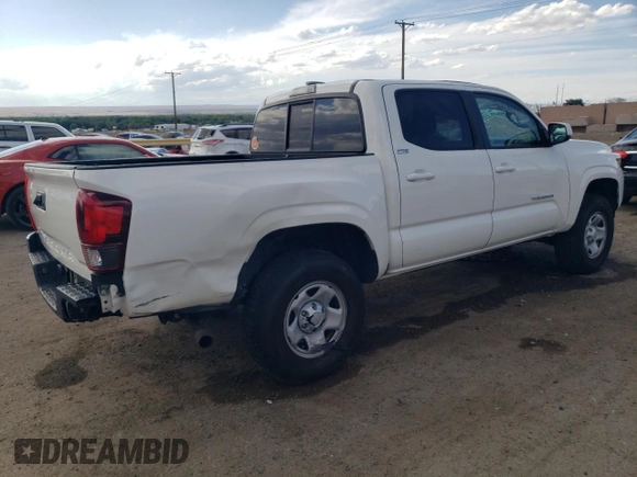 2021 Toyota Tacoma SR with VIN 3TYAX5GN5MT015924, listed as a Copart auction lot 59523615 with 79,693 mi miles and Salvage title. Bid and sale history available at DreamBid. Image 3.