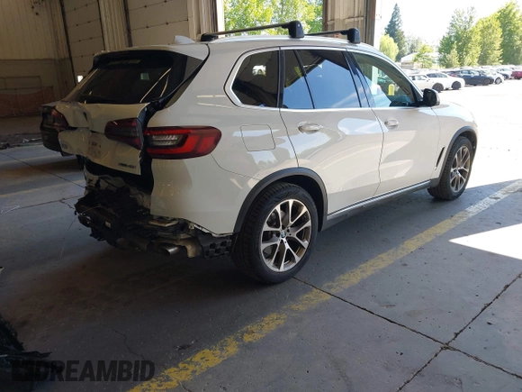 2022 BMW X5 xDrive40i with VIN 5UXCR6C09N9M21945, listed as a IAAI auction lot 42170363 with 23,537 mi miles and . Bid and sale history available at DreamBid. Image 4.
