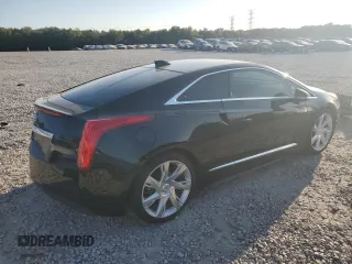 2014 Cadillac ELR z VIN 1G6RL1E4XEU602018, wystawiony jako Copart lot #74824784 z przebiegiem 90 159 mil mil oraz Tytuł czysty. Historia ofert i sprzedaży dostępna na DreamBid. Obrazek 3.