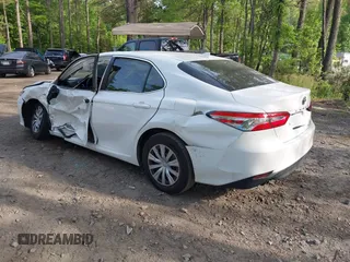 2019 Toyota Camry Hybrid LE z VIN 4T1B31HK4KU005351, wystawiony jako IAAI lot #42162802 z przebiegiem 89 187 mil mil oraz . Historia ofert i sprzedaży dostępna na DreamBid. Obrazek 3.