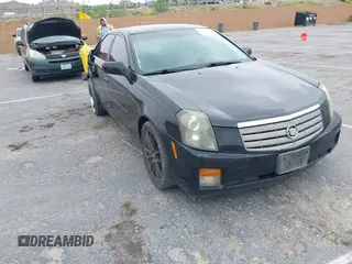 2005 Cadillac CTS z VIN 1G6DP567750234936, wystawiony jako IAAI lot #42392235 z przebiegiem 140 351 mil mil oraz . Historia ofert i sprzedaży dostępna na DreamBid. Obrazek 1.