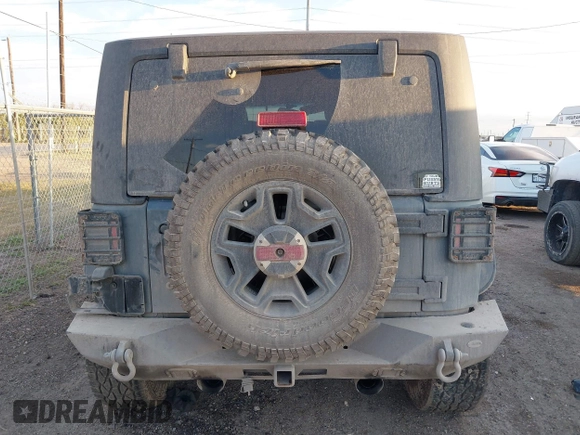 2014 Jeep Wrangler Sport with VIN 1C4AJWAG0EL326774, listed as a IAAI auction lot 41691784 with 98,696 mi miles and . Bid and sale history available at DreamBid. Image 17.