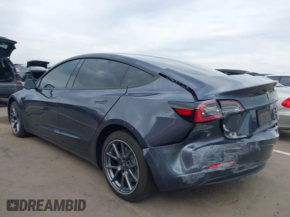 2022 Tesla Model 3 Long Range with VIN 5YJ3E1EB9NF164774, listed as a IAAI auction lot 41915755 with 39,625 mi miles and . Bid and sale history available at DreamBid. Image 6.