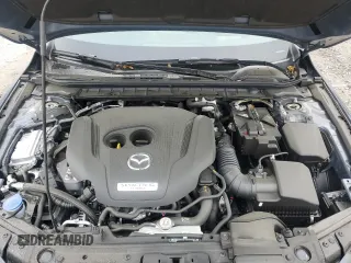 2025 Mazda 3 Premium Plus z VIN JM1BPBEY5S1762106, wystawiony jako Copart lot #51500675 z przebiegiem 2 770 mil mil oraz Szkoda całkowita • Salvage title. Historia ofert i sprzedaży dostępna na DreamBid. Obrazek 12.