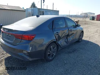 2023 Kia Forte LXS z VIN 3KPF24AD8PE585604, wystawiony jako IAAI lot #42098930 z przebiegiem 18 946 mil mil oraz . Historia ofert i sprzedaży dostępna na DreamBid. Obrazek 4.