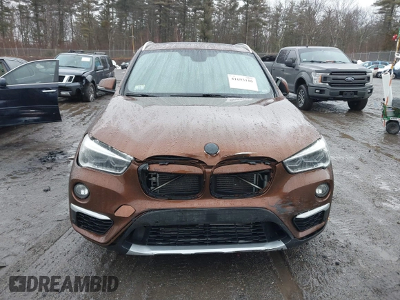 2016 BMW X1 xDrive28i with VIN WBXHT3C31GP881488, listed as a IAAI auction lot 41693116 with 120,922 mi miles. Bid and sale history available at carsss.com. Image 12.