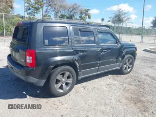 2014 Jeep Patriot Latitude with VIN 1C4NJPFA6ED680773, listed as a IAAI auction lot 41569916 with 135,590 mi miles and . Bid and sale history available at carsss.com. Image 4.