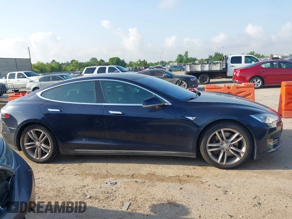 2014 Tesla Model S 60 with VIN 5YJSA1H12EFP39873, listed as a IAAI auction lot 42443414 with 132,773 mi miles and . Bid and sale history available at DreamBid. Image 13.