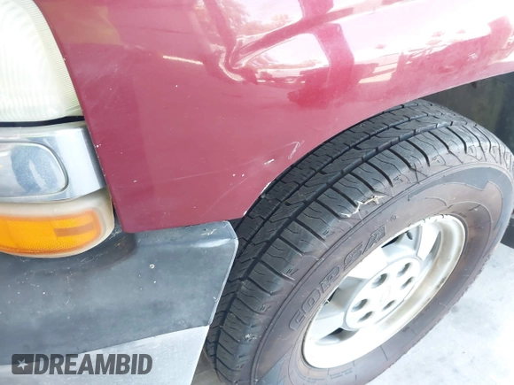 2003 Chevrolet Suburban LS with VIN 1GNEC16T13J311799, listed as a IAAI auction lot 42749805 with 354,818 mi miles and . Bid and sale history available at DreamBid. Image 12.