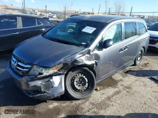2014 Honda Odyssey LX with VIN 5FNRL5H27EB048315, listed as a IAAI auction lot 41417864 with 110,346 mi miles. Bid and sale history available at carsss.com. Image 2.