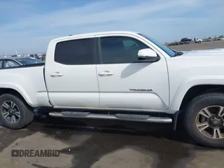 2017 Toyota Tacoma SR5 with VIN 3TMDZ5BN9HM029700, listed as a IAAI auction lot 42034375 with 86,907 mi miles. Bid and sale history available at carsss.com. Image 14.
