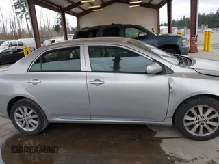 2009 Toyota Corolla with VIN JTDBL40E299069381, listed as a IAAI auction lot 41838258 with 197,992 mi miles. Bid and sale history available at carsss.com. Image 13.