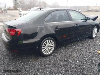 2016 Volkswagen Jetta Sedan 1.8T SEL with VIN 3VWL17AJ6GM380816, listed as a IAAI auction lot 41617737 with NaN miles. Bid and sale history available at carsss.com. Image 4.