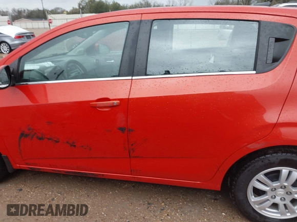 2013 Chevrolet Sonic LT with VIN 1G1JC6SHXD4139822, listed as a IAAI auction lot 41672289 with 87,899 mi miles. Bid and sale history available at carsss.com. Image 14.