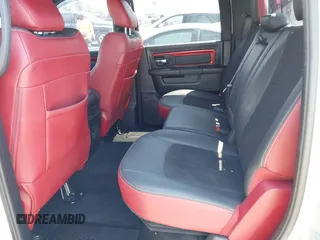 2016 Ram 1500 Rebel z VIN 1C6RR7YT5GS251994, wystawiony jako IAAI lot #42139378 z przebiegiem 102 736 mil mil oraz . Historia ofert i sprzedaży dostępna na DreamBid. Obrazek 8.