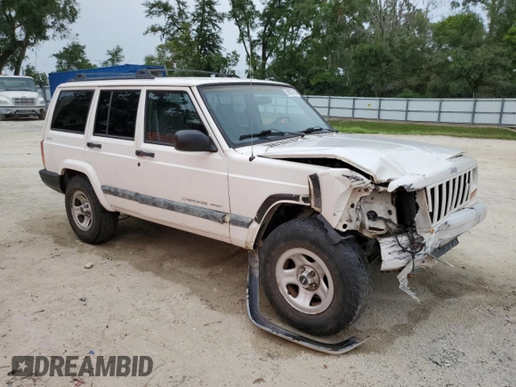 2001 Jeep Cherokee Sport with VIN 1J4FF48S31L520760, listed as a Copart auction lot 59807625 with 298,489 mi miles and Salvage title. Bid and sale history available at DreamBid. Image 4.