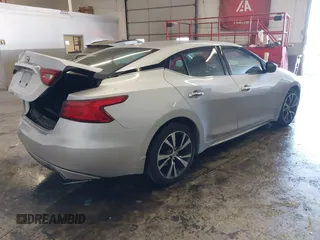 2017 Nissan Maxima Platinum with VIN 1N4AA6AP4HC450539, listed as a IAAI auction lot 41437857 with 53,555 mi miles and . Bid and sale history available at DreamBid. Image 4.