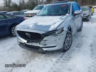 2021 Mazda CX-5 Grand Touring Reserve with VIN JM3KFBAY0M0377030, listed as a IAAI auction lot 41606709 with 39,590 mi miles. Bid and sale history available at carsss.com. Image 6.
