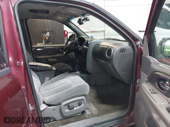 2002 GMC Envoy SLT with VIN 1GKDT13SX22426320, listed as a IAAI auction lot 41709359 with 104,418 mi miles. Bid and sale history available at carsss.com. Image 5.