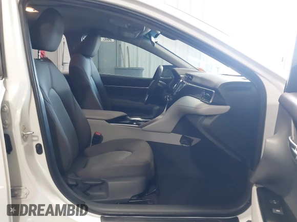 2019 Toyota Camry LE with VIN 4T1B11HK4KU853137, listed as a IAAI auction lot 41633785 with 67,629 mi miles and . Bid and sale history available at DreamBid. Image 5.