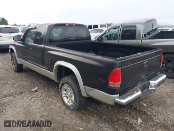 2001 Dodge Dakota SLT with VIN 1B7GG22XX1S255292, listed as a IAAI auction lot 41100133 with 168,454 mi miles and . Bid and sale history available at carsss.com. Image 3.