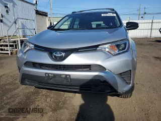 2018 Toyota RAV4 LE with VIN JTMBFREVXJJ220838, listed as a Copart auction lot 52870975 with 125,456 mi miles and Salvage Title. Bid and sale history available at carsss.com. Image 5.
