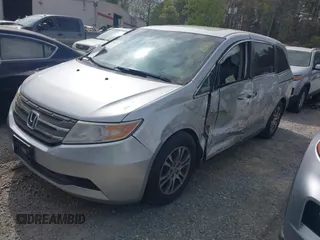 2012 Honda Odyssey EX-L with VIN 5FNRL5H66CB069916, listed as a IAAI auction lot 41935248 with 230,204 mi miles and . Bid and sale history available at carsss.com. Image 17.