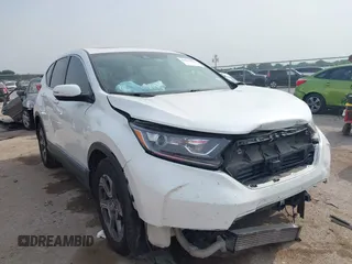 2019 Honda CR-V EX z VIN 7FARW1H51KE019516, wystawiony jako IAAI lot #42265911 z przebiegiem 96 802 mil mil oraz . Historia ofert i sprzedaży dostępna na DreamBid. Obrazek 1.
