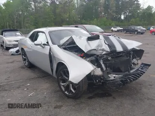 2019 Dodge Challenger SXT z VIN 2C3CDZAG9KH744703, wystawiony jako IAAI lot #41881944 z przebiegiem Nie podano mil oraz . Historia ofert i sprzedaży dostępna na DreamBid. Obrazek 1.