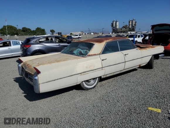 1963 Cadillac DeVille z VIN 63N073265, wystawiony jako Copart lot #58598785 z przebiegiem 79 382 mil mil oraz Czysty tytuł • Clean title. Historia ofert i sprzedaży dostępna na DreamBid. Obrazek 3.