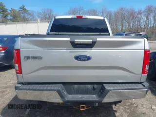 2015 Ford F-150 XLT with VIN 1FTEW1EG5FFA40936, listed as a IAAI auction lot 42011697 with 199,722 mi miles. Bid and sale history available at carsss.com. Image 16.