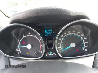 2018 Ford Fiesta SE z VIN 3FADP4EJXJM100407, wystawiony jako IAAI lot #42285374 z przebiegiem 90 261 mil mil oraz . Historia ofert i sprzedaży dostępna na DreamBid. Obrazek 7.
