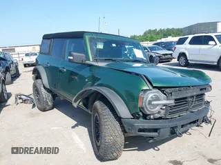 2023 Ford Bronco with VIN 1FMEE5DP0PLB60332, listed as a IAAI auction lot 42200832 with 54,921 mi miles and . Bid and sale history available at DreamBid. Image 1.