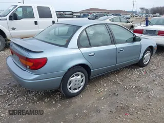 2002 Saturn SL z VIN 1G8ZK52702Z105381, wystawiony jako IAAI lot #41962378 z przebiegiem 169 204 mil mil oraz . Historia ofert i sprzedaży dostępna na DreamBid. Obrazek 4.