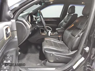 2014 Jeep Grand Cherokee Overland with VIN 1C4RJFCGXEC153250, listed as a Copart auction lot 51327195 with 132,282 mi miles and Clean Title. Bid and sale history available at DreamBid. Image 7.