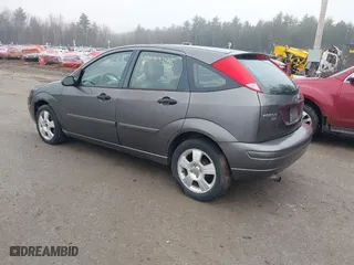 2006 Ford Focus S with VIN 1FAFP37N26W180795, listed as a IAAI auction lot 42100395 with 125,002 mi miles. Bid and sale history available at carsss.com. Image 3.