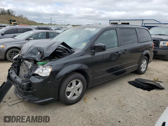 2012 Dodge Grand Caravan SXT with VIN 2C4RDGCG5CR253449, listed as a Copart auction lot 54592975 with 86,200 mi miles and Non Repairable. Bid and sale history available at DreamBid. Image 1.