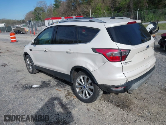 2017 Ford Escape Titanium with VIN 1FMCU9JD9HUB40135, listed as a IAAI auction lot 42054533 with 68,255 mi miles. Bid and sale history available at carsss.com. Image 3.