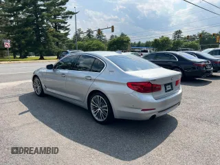 2018 BMW 5 Series 530e with VIN WBAJA9C59JG623166, listed as a Copart auction lot 60938995 with 82,070 mi miles and Clean title. Bid and sale history available at DreamBid. Image 3.